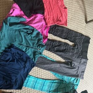 Lululemon Athletica bundle. 3 leggings, 1 skirt,4 tops